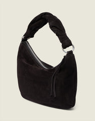 Side shot of the Crescent Bag In Black Suede