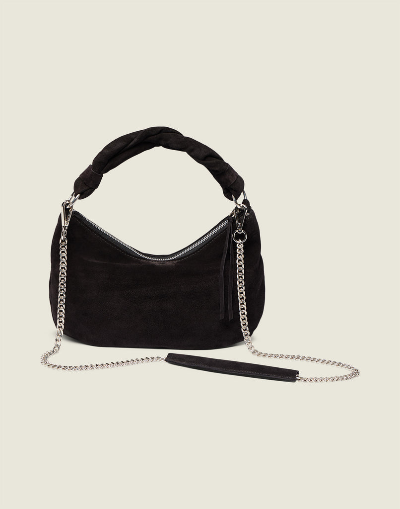 Front shot of the Crescent Bag In Black Suede with chain