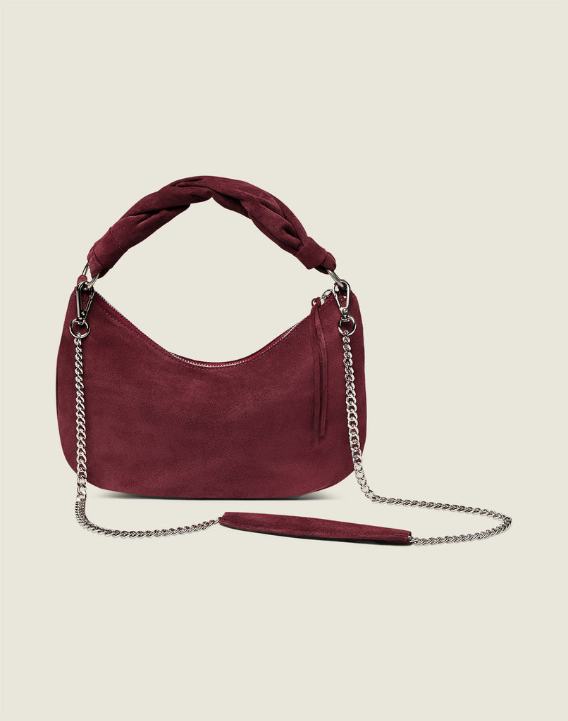 Front shot of the Crescent Bag in Merlot with chain