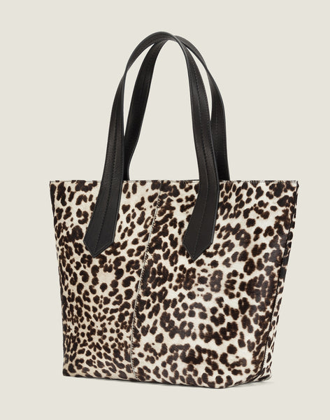 SIDE SHOT OF THE TAB TOTE IN SNOW LEOPARD
