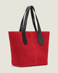 SIDE SHOT  OF THE TAB TOTE IN RED SUEDE