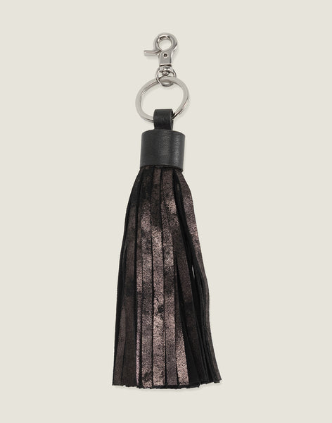 FRONT SHOT OF THE TASSEL KEYCHAIN IN BLACK