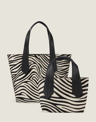 Front shot of the Tab Tote in Zebra Haircalf and the Tab Tote Mini in Zebra Haircalf