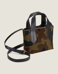 SIDE SHOT OF THE TAB TOTE MINI IN CAMO HAIR CALF AND LEATHER CROSSBODY STRAP