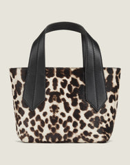 FRONT SHOT OF THE TAB TOTE MINI IN SNOW LEOPARD