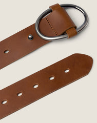 FRONT SHOT OF THE ANY-WEAR BELT IN COGNAC FEATURING SILVER HARDWARE AND ADJUSTABLE HOLE CLOSURES