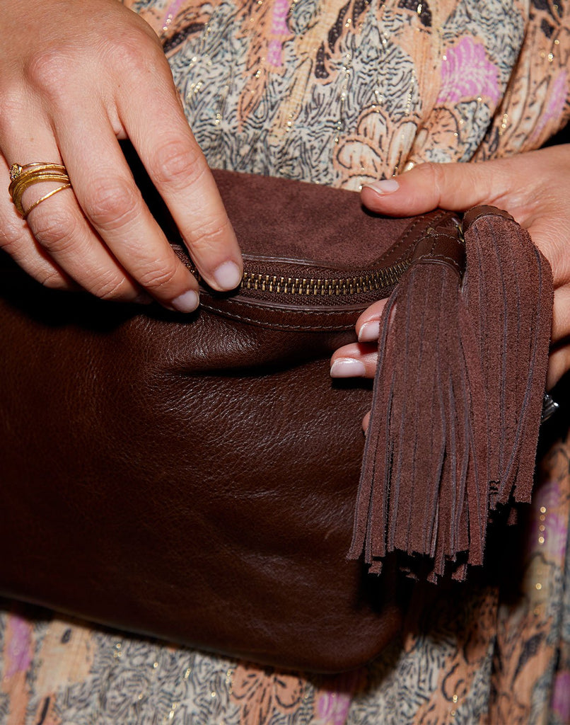 Detail shot of Convertible Fringe Belt Bag in Chocolate